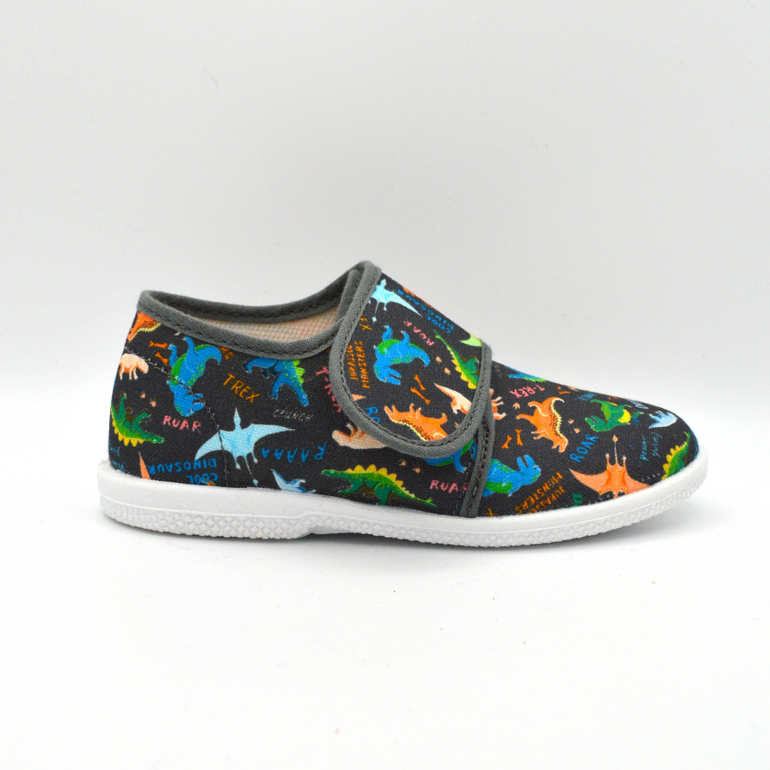 Coccole | Slip on in tela con velcro blu con dinosauri