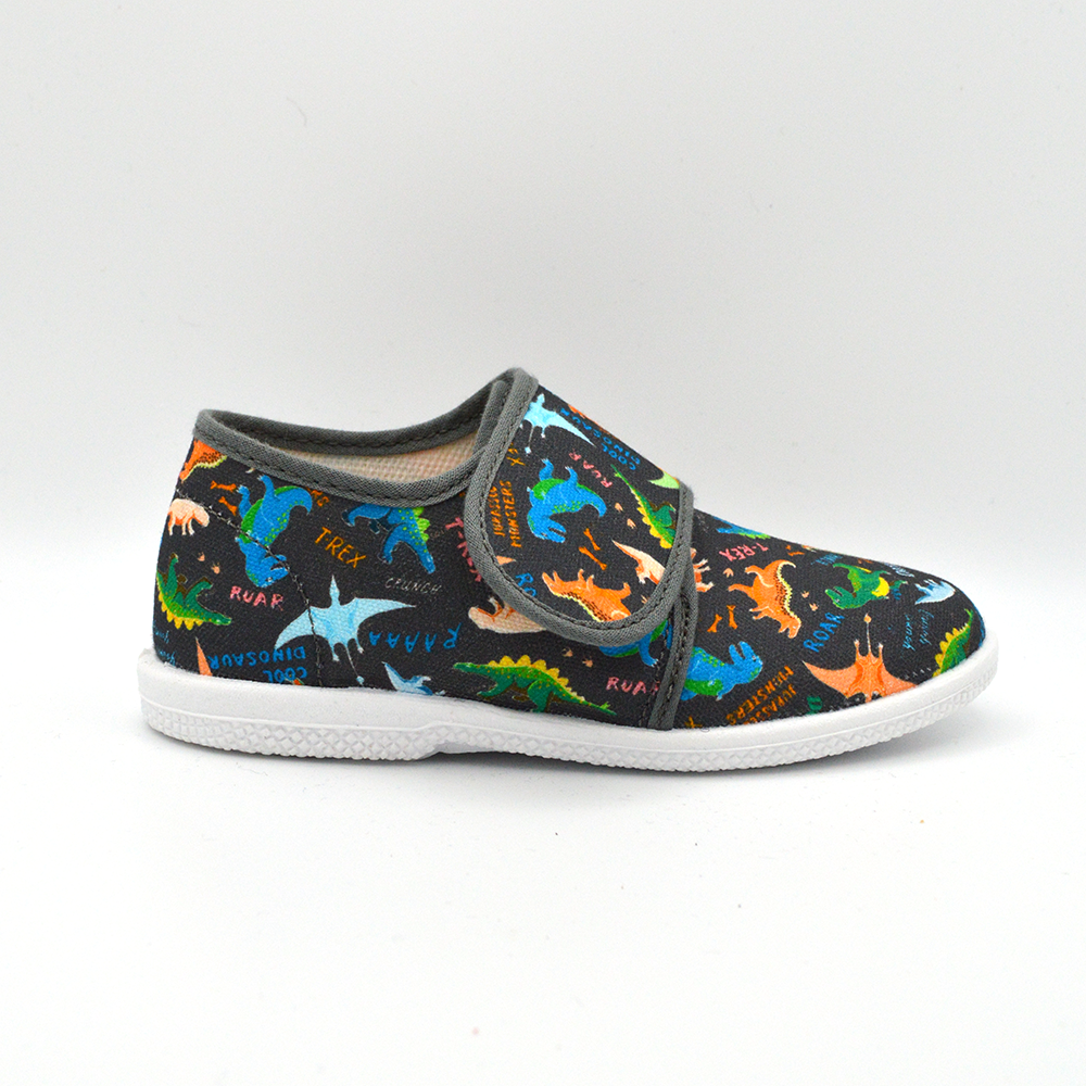 Coccole | Slip on in tela con velcro blu con dinosauri
