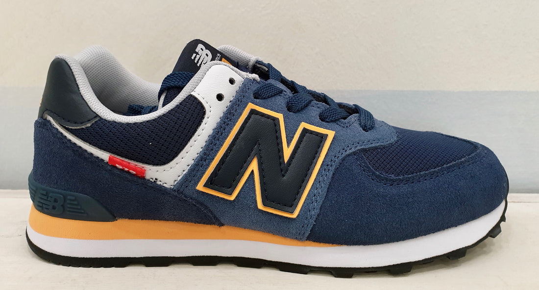 NEW BALANCE 574 blue and yellow laces